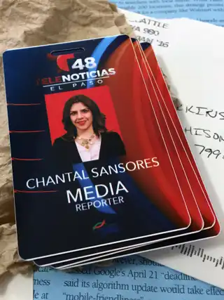 Front of a printed Telenoticias reporter press credential