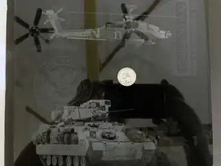 AH-64 Apache and Bradley fighting vehicle image etched into glass