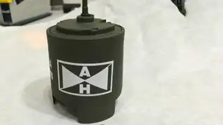 Customized M75 practice grenade prepared as a military service gift