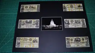 Custom-cut matting prepared for a Texas currency display