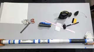 Stencils positioned on restored Hydra 70 rocket body