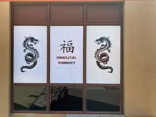 Oriental Imports storefront window graphics, view 1